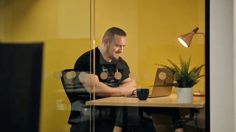 Cantarus staff member working in private office