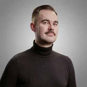 Headshot of Cantarus' Head of Experience Design, Rob