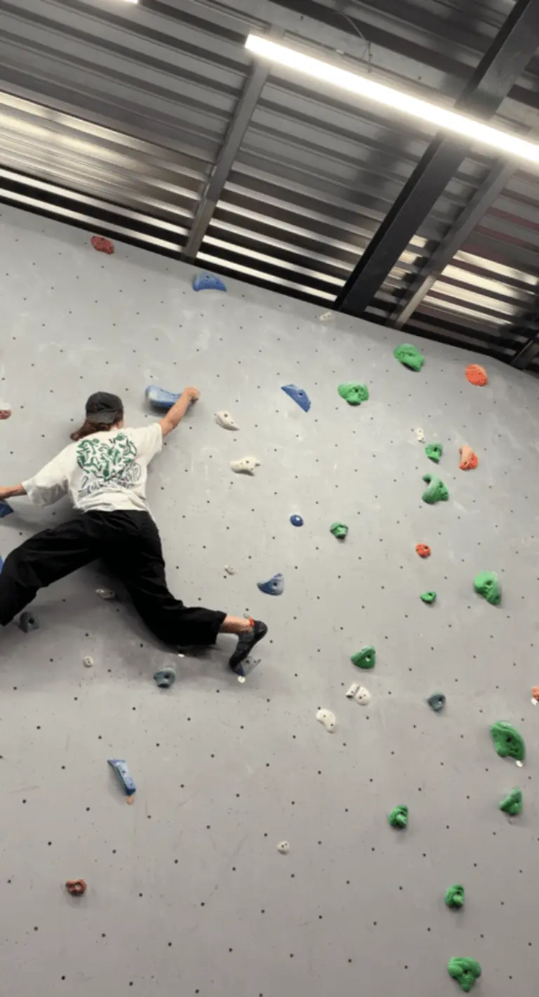 Alex on climbing wall