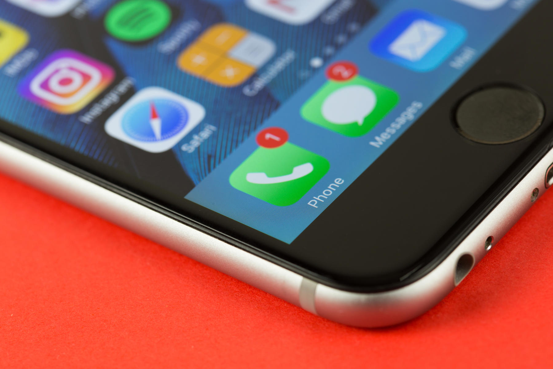 the bottom corner of a smartphone screen, showing an array of apps