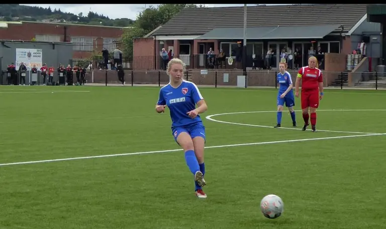 Jenny playing football
