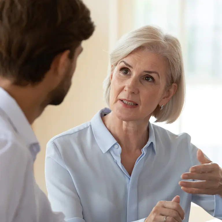 two people in conversation