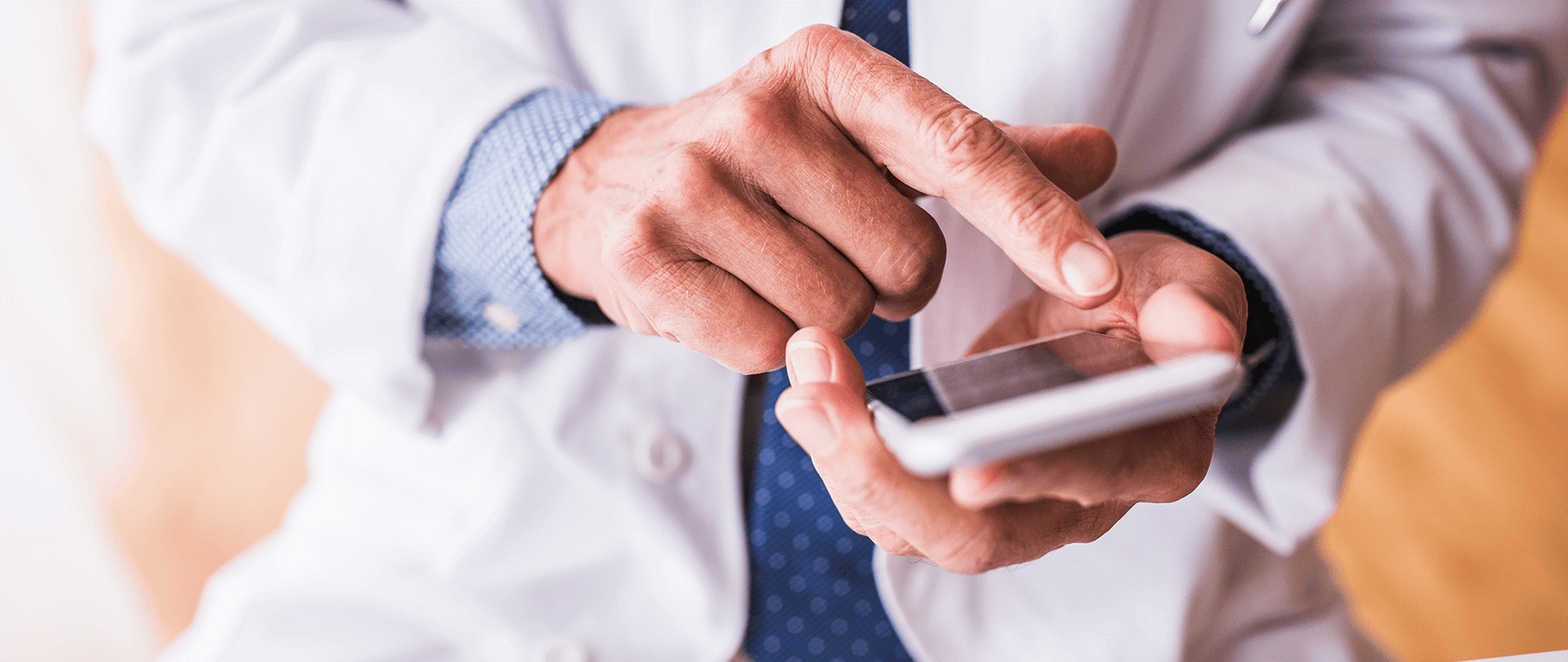 Royal College of GP doctor accessing information via app